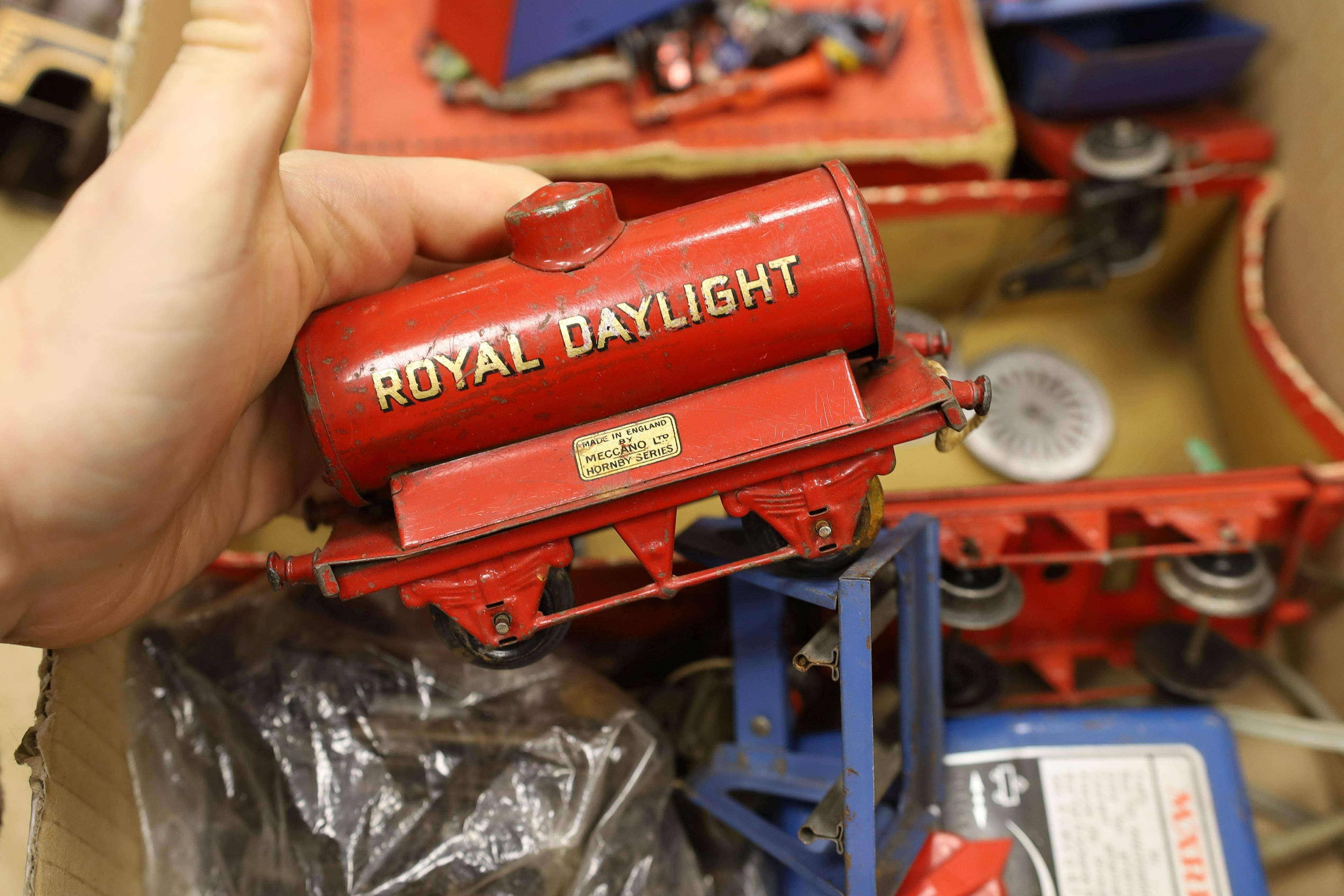 A mixed quantity of Hornby model railway track, a metal crossing, an engine and other items